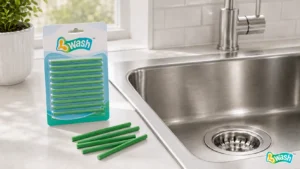 drain cleaner sticks beside a kitchen sink for routine drain maintenance